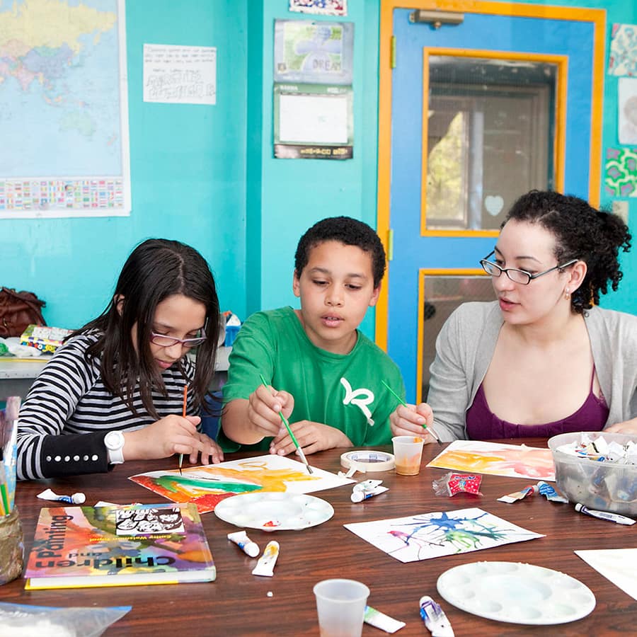 UMass student teaches art at Denny afterschool program.
