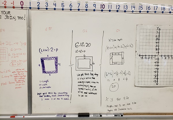 7th Graders wrote on the board the ways they solved a math problem.