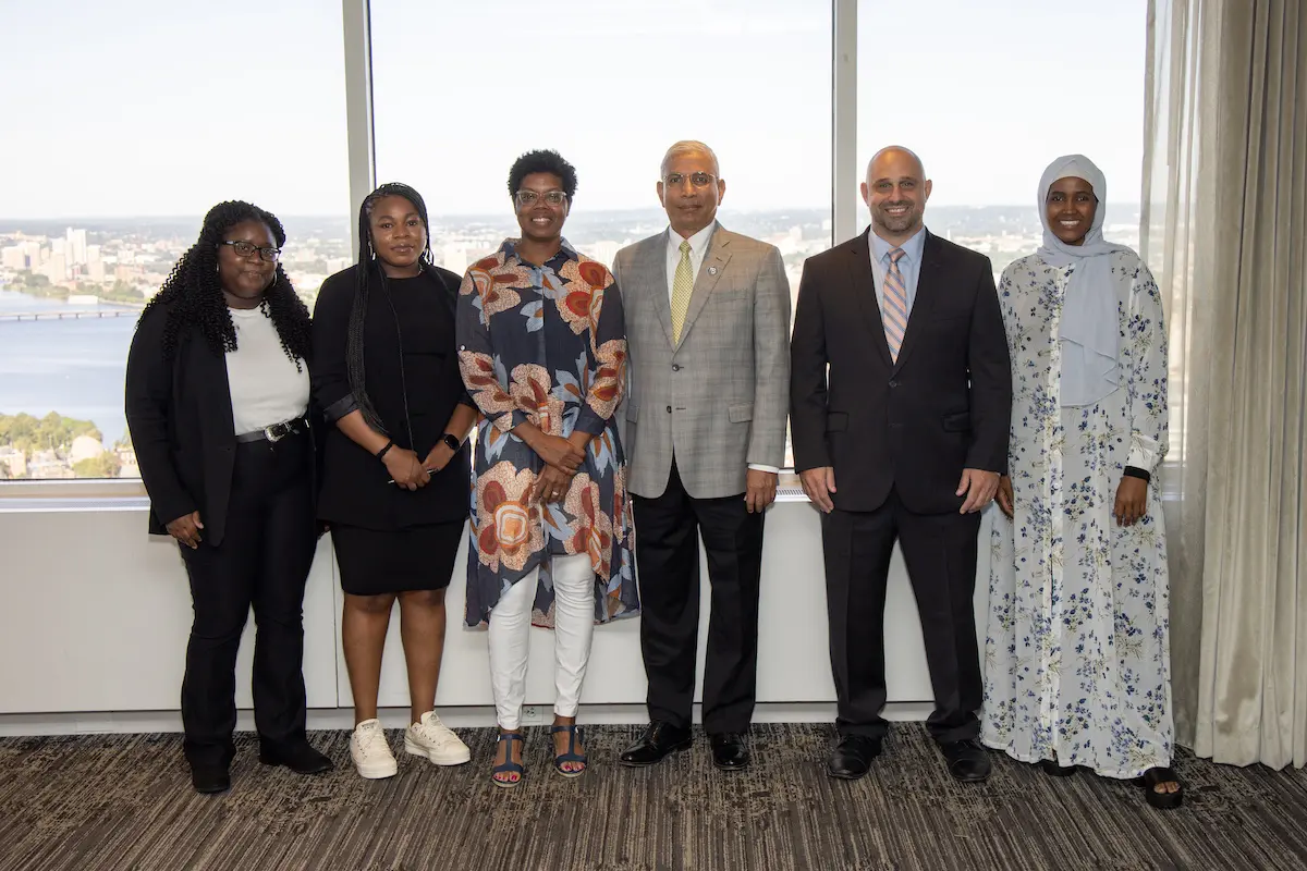 Dean Venky Venkatachalam and the participating College of Management students at the UMass Club for the BEST Boston Pilot Presentations.