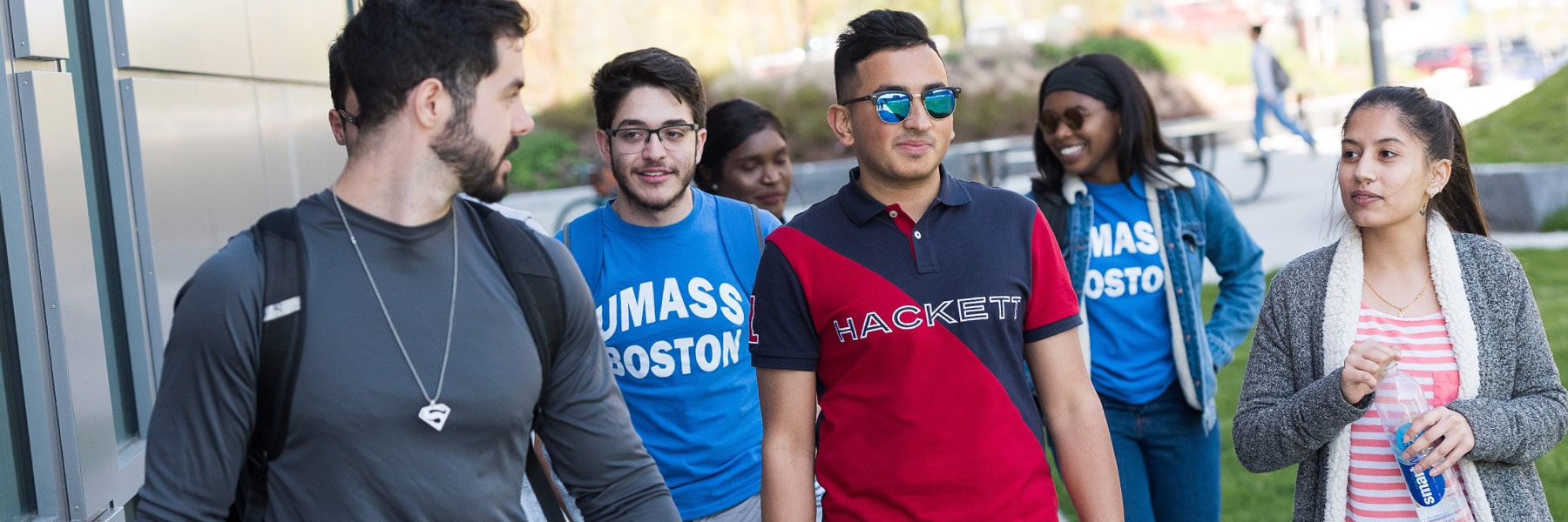 student employees walking on campus