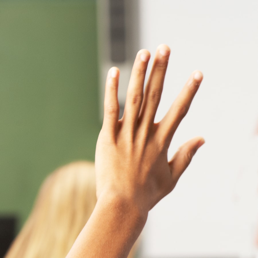 close up of raised hand