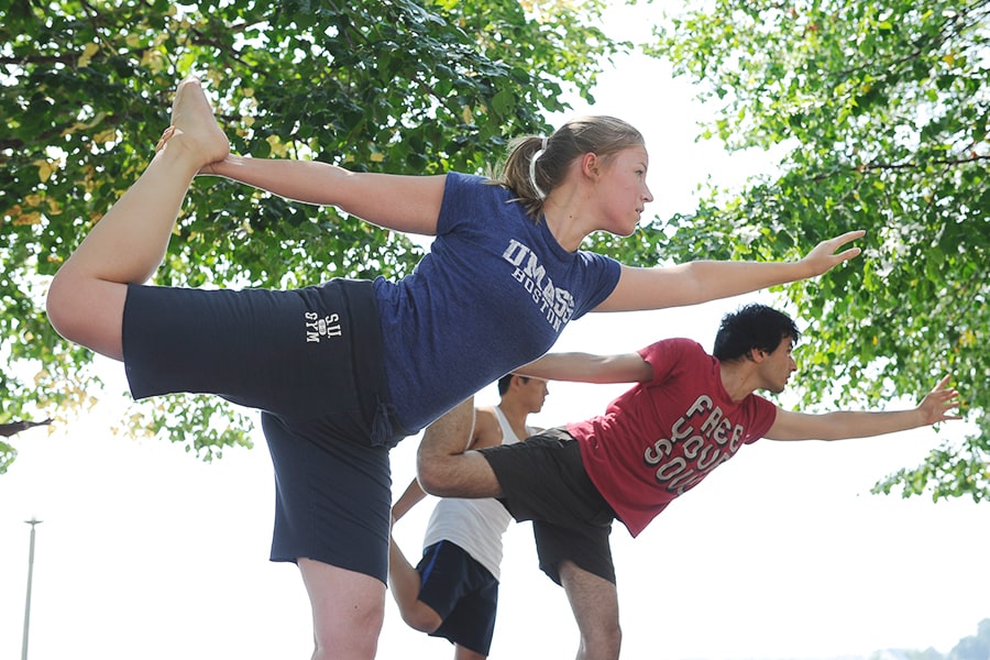 students in upright dancer -ike yoga pose
