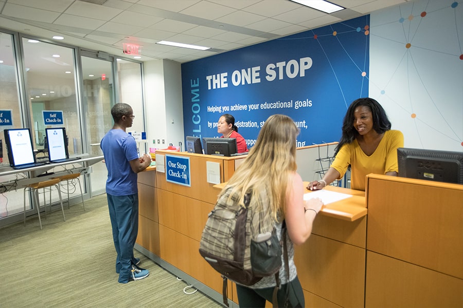 Student gets help at the One Stop counter.