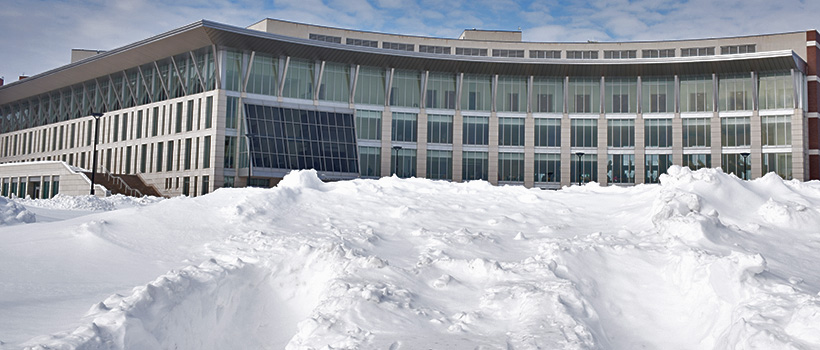 Snow piled up in front of the Campus Center