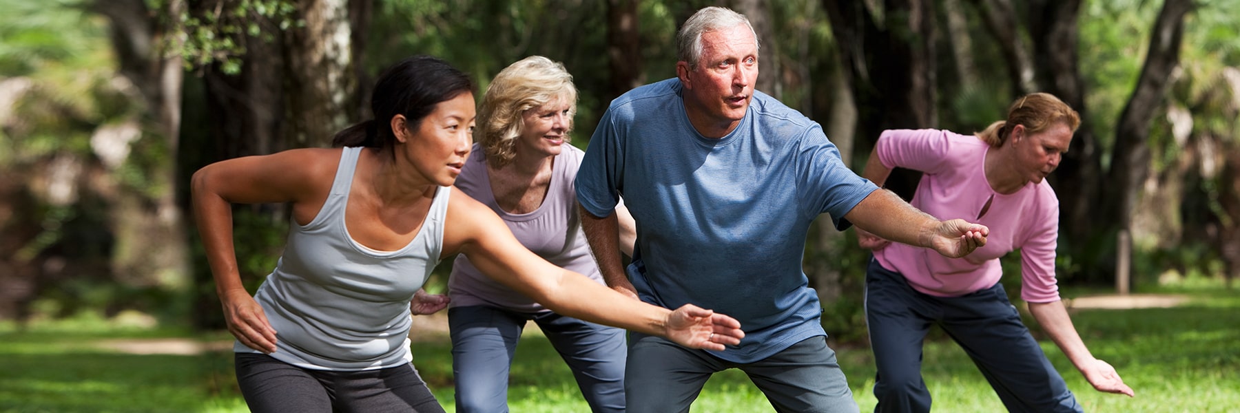 Aging Studies Minor group of adults exercises outside.