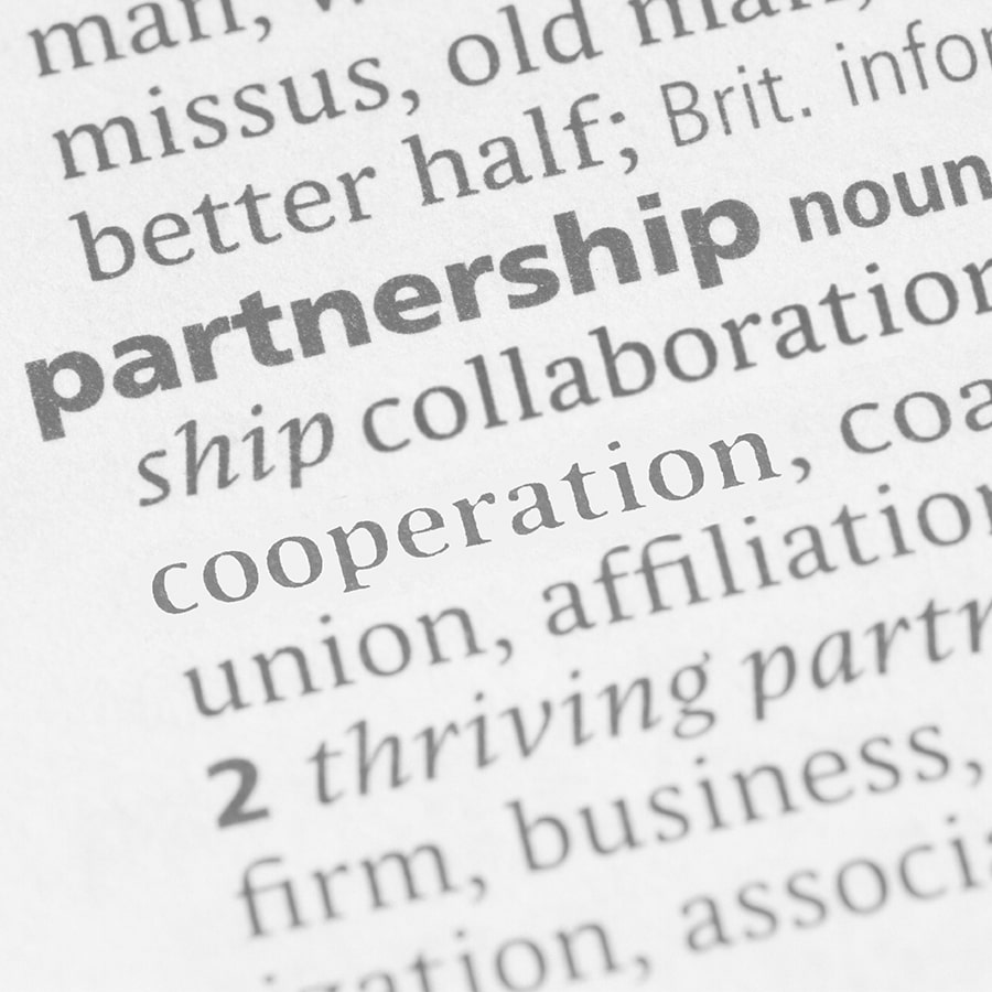 dictionary definition of partnership on a page.