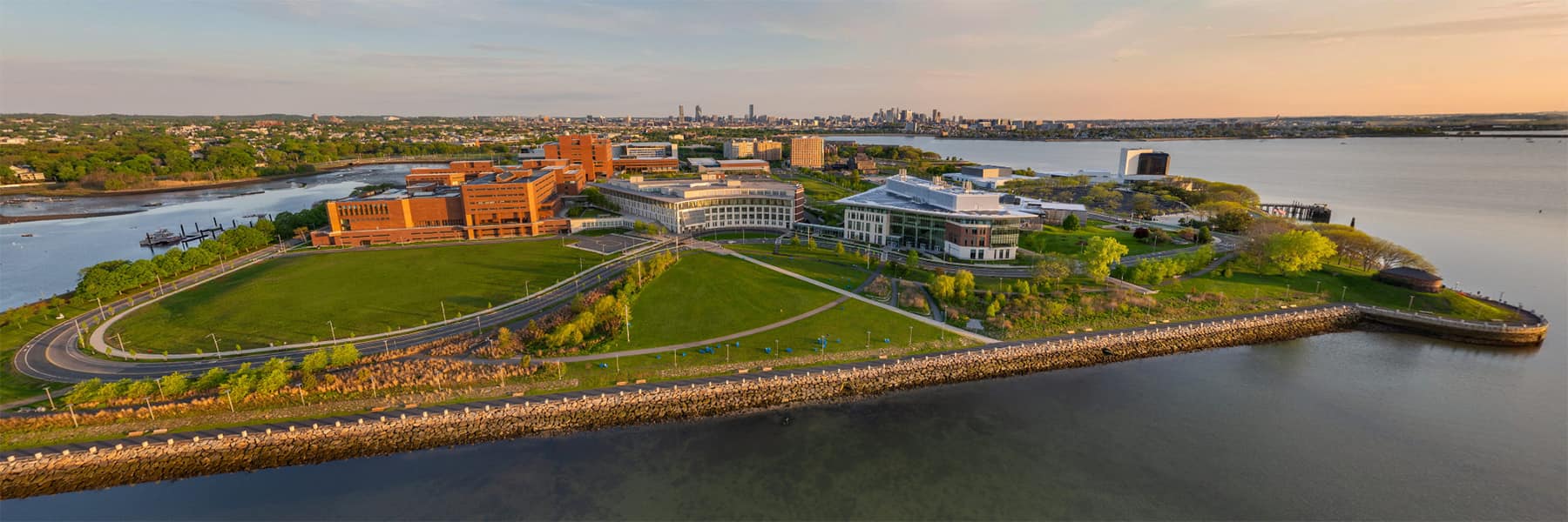 Aerial view of UMass Boston Campus with Boston skyline