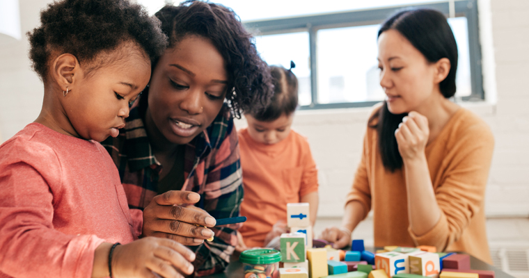 Early educations providers interact with children 