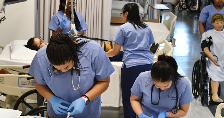 Nursing students practicing skills in the South Skills Lab of the CCER