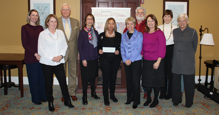 Goddard House President and CEO Candace Cramer presents CNHS Dean Linda Thompson with the Goddard House - Doane Scholarship gift 