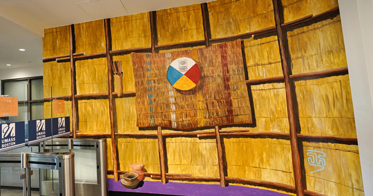 Robert Peters, an artist and member of the Mashpee Wampanoag Tribe, created a mural in UMass Boston’s first residence hall. 