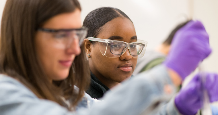 Three students in a lab 