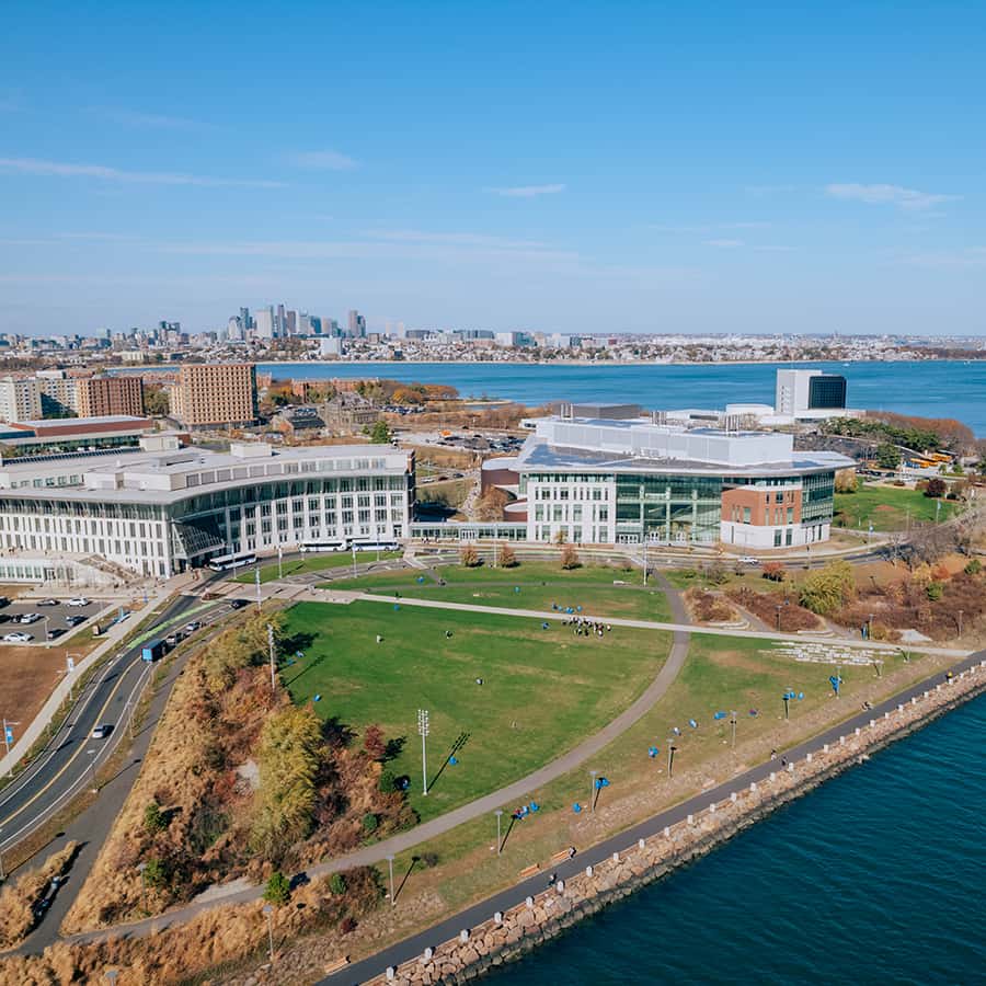 Aerial view of UMass Boston Campus with Boston skyline