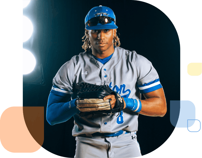 Student in UMass Boston Baseball uniform with baseball glove.