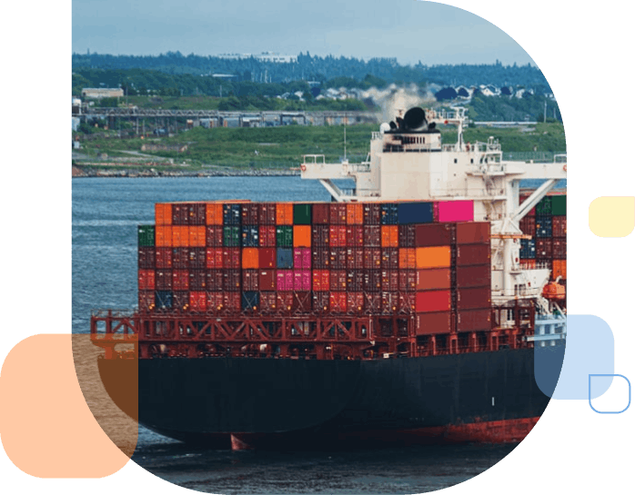 A container ship departs a harbour on the East coast.