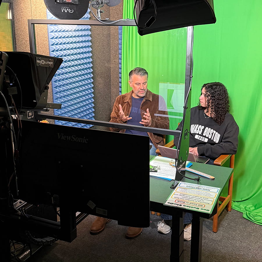 students in media sound room with surrounding equipment