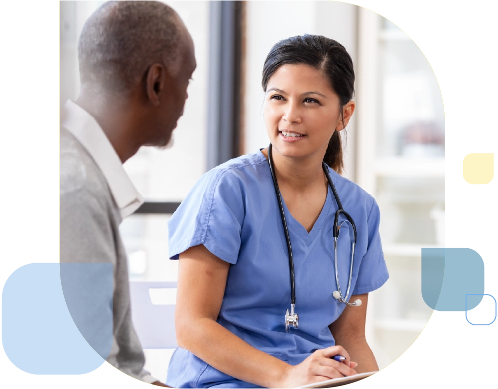 nurse practitioner with stethescope around neck and hands on clipboard counseling patient