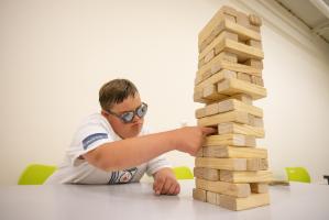 Boy Playing Jenga