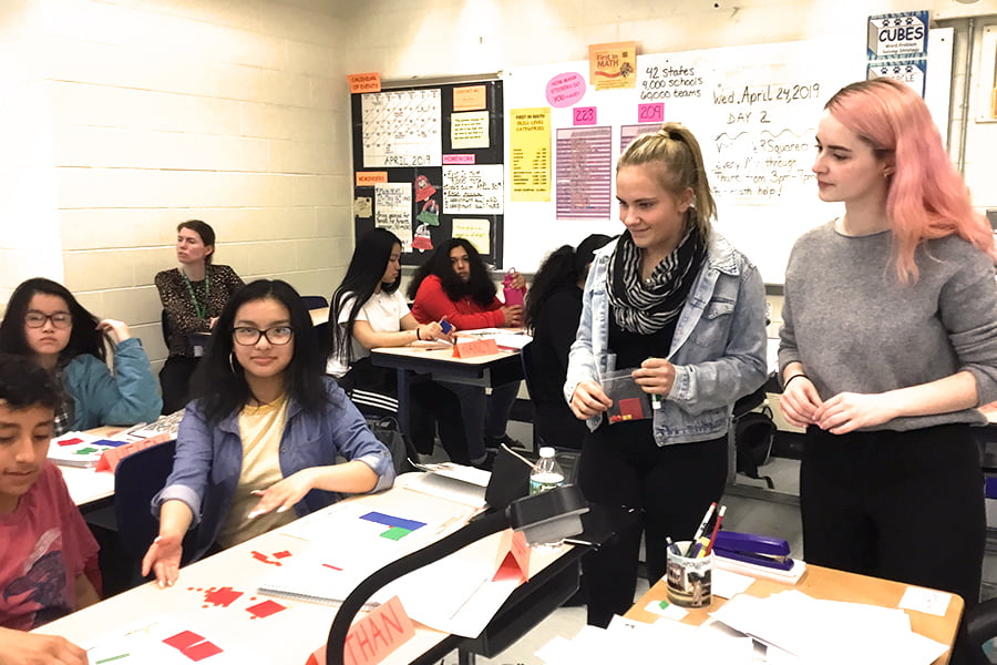 UTeach two student teachers in classroom.