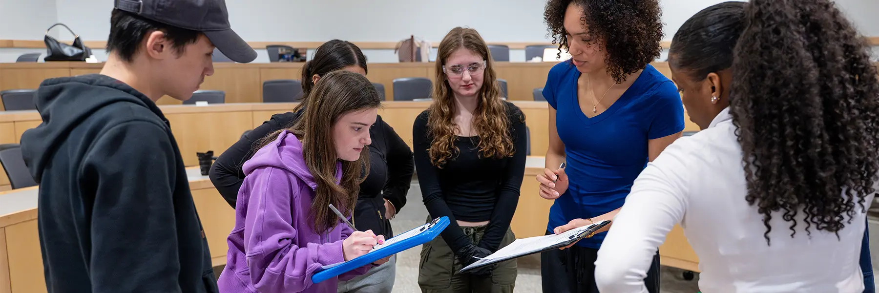 Students work on tablets in a public health class.
