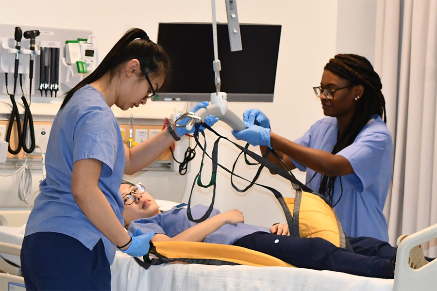 nursing students practicing in facility labs