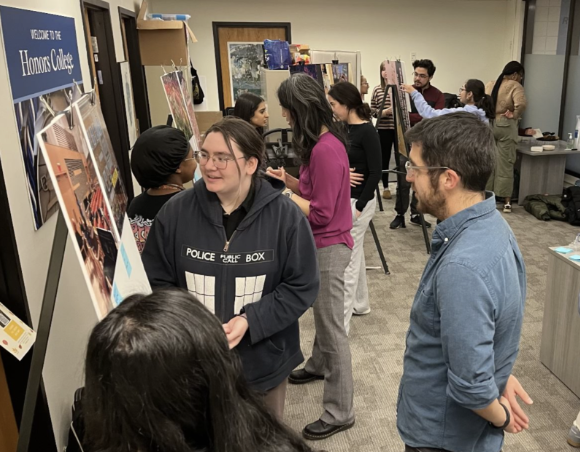 people looking at photo canvases
