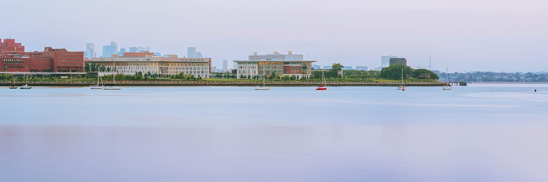Sunset view of campus from the water