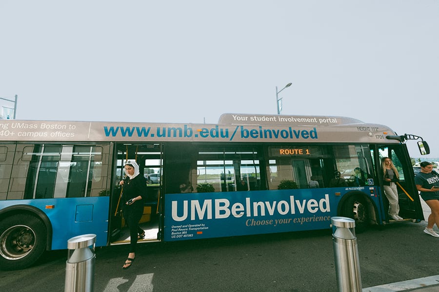 UMass Boston shuttle bus at the Campus Center stop.